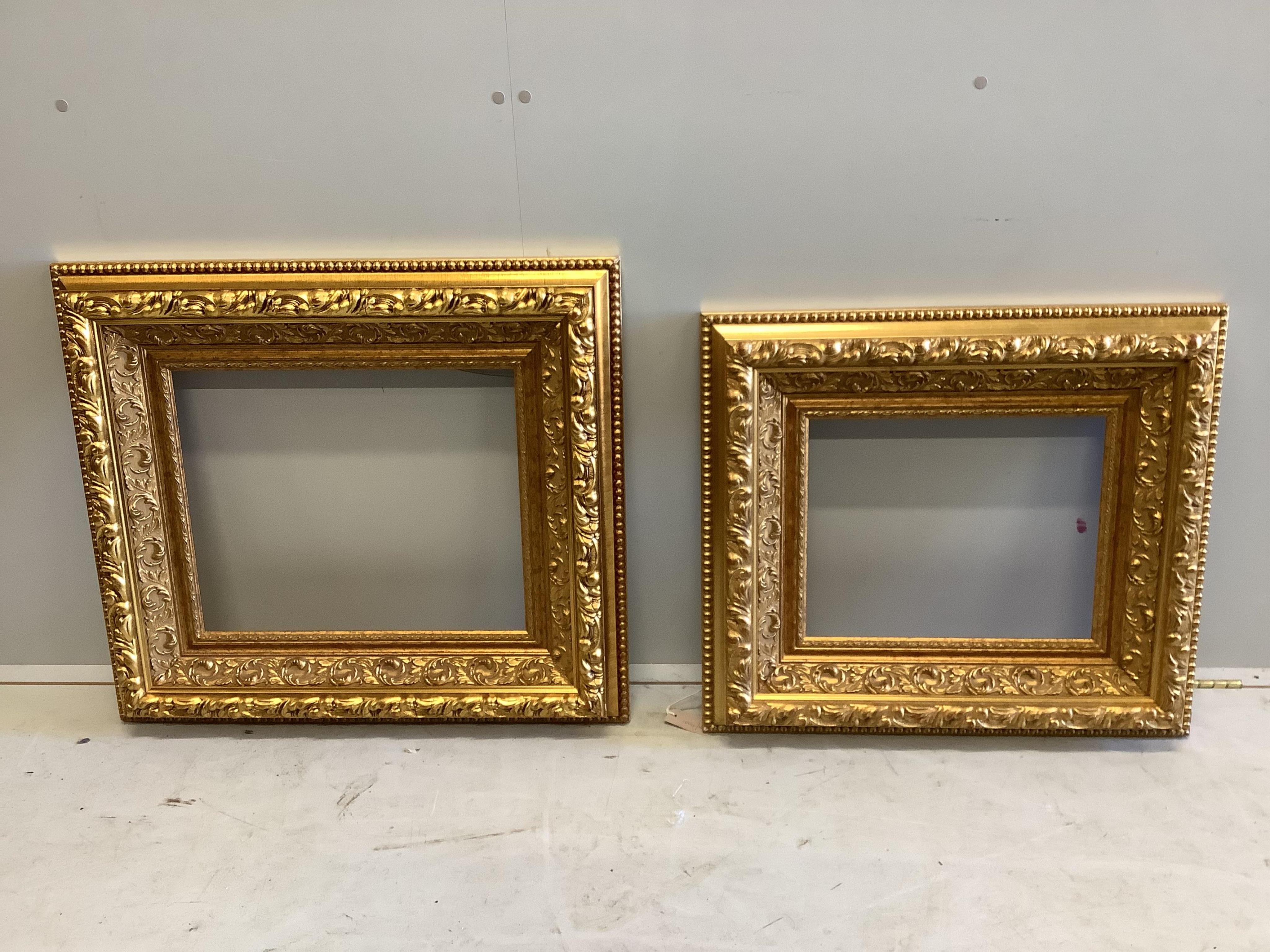 Two Victorian style rectangular gilt frames, larger width 69cm, height 78cm. Condition - fair to good